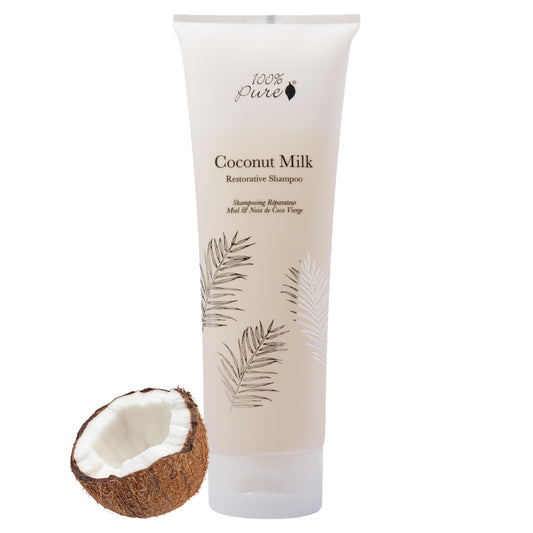 100% PURE Coconut Milk Restorative Shampoo bottle demonstrates hydrating cleanse for dry hair