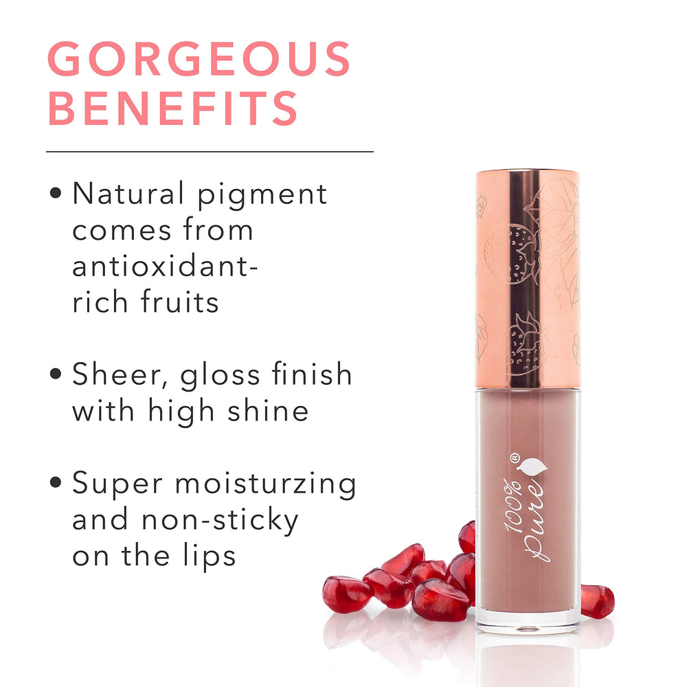 Close-up of 100% PURE Lip Gloss Pink Caramel tube showing smooth, non-sticky texture