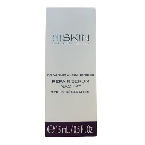 111SKIN NAC Y2 travel-size bottle in hand for on-the-go care.
