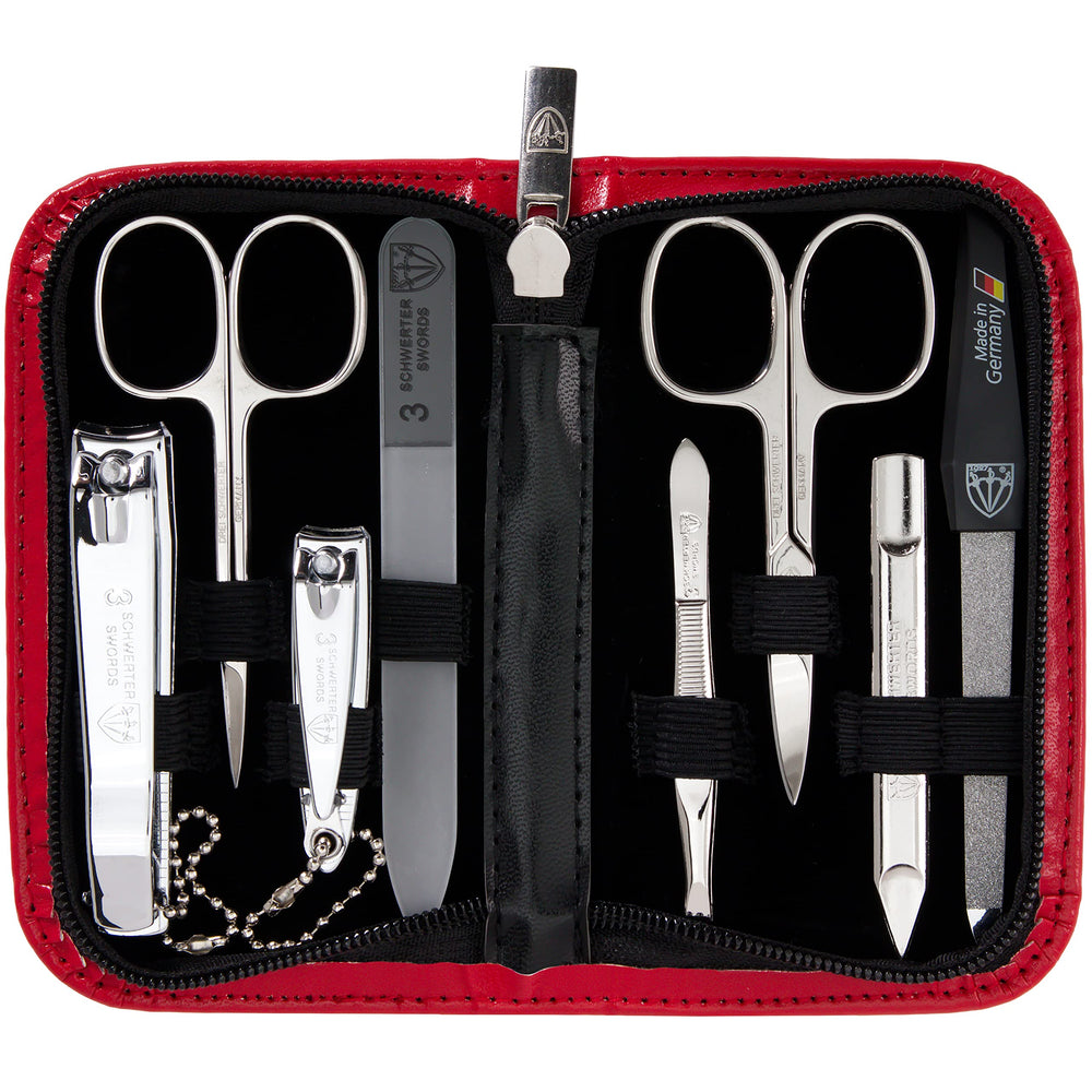 3 Swords Germany 8-piece kit in red case opened for grooming use