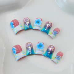10Pcs Blue Flower Press On Nails with 3D flower rhinestones for subtle sparkle.