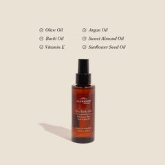 A LA MAISON bottle close up highlights sweet almond oil for nourishing skin.