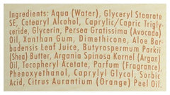 A La Maison orange bergamot lotion on skin demonstrates lightweight hydration.