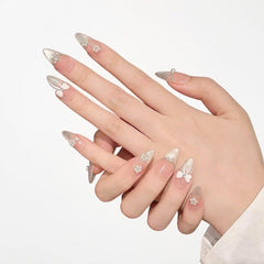 A021 nude gradient cat’s eye nails with pearl bow for elegant weddings