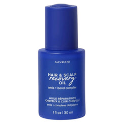 AAVRANI Hair & Scalp Recovery Oil bottle pouring for scalp nourishment and frizz control