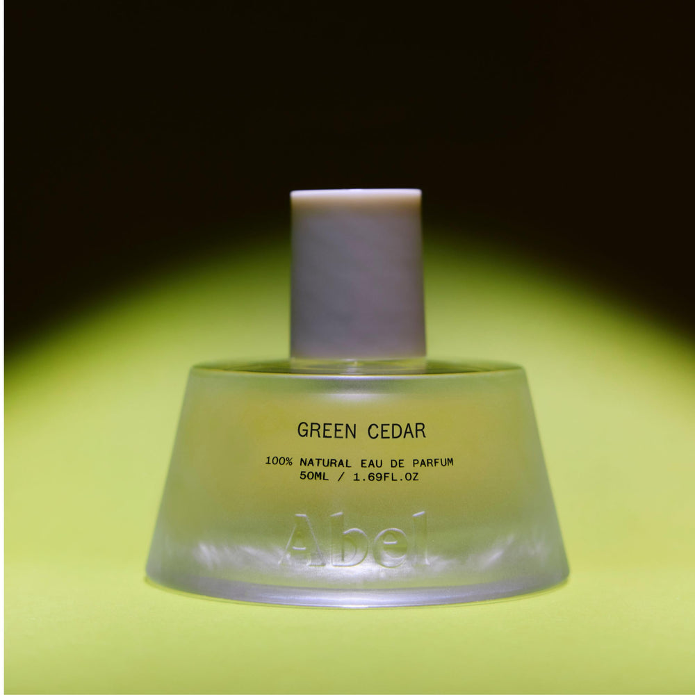 ABEL Green Cedar base notes cedarwood delivering enduring warmth.