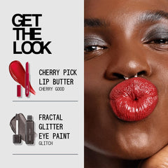 about-face Cherry Pick bold red shade on lips with a high-shine finish.