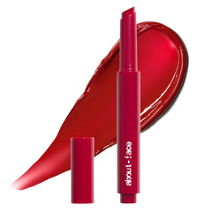 about-face Cherry Pick Lip Color Butter on lips with vivid shine and hydration.