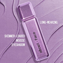 About Face Fractal Glitter Eye Paint close-up texture highlights smooth, buildable mousse shimmer on lids.