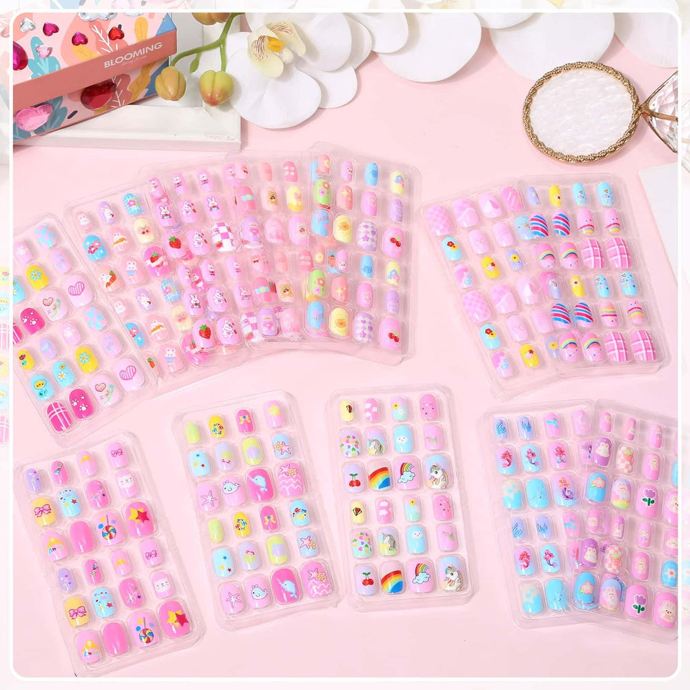 Acejoz 12 patterns press-on nails with colorful designs for creative kids' looks.