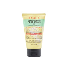 Adamia Therapeutic Repair Foot Cream tube featuring pure macadamia oil for intense hydration.