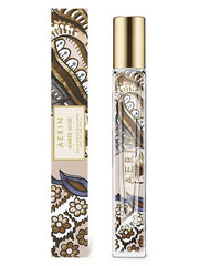 AERIN Amber Musk travel spray bottle for on-the-go fragrance.