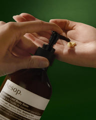 Packaging details highlight recycled plastic bottle for Aesop balm