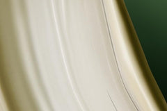 Creamy texture of Aesop Geranium Leaf Body Balm during application