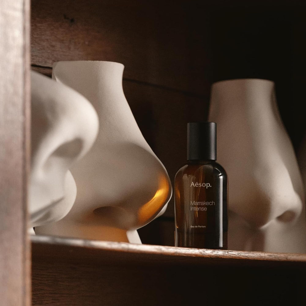 Aesop Marrakech Intense amber flacon, glass glow hints at woody-spicy heart.