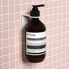 Aesop Resurrection Hand Wash liquid texture closeup for luxurious lather.