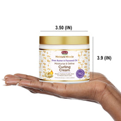 Glossy curls after using African Pride Moisture Miracle Curling Cream.