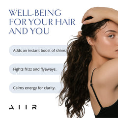 AIIR Shine Spray on hair delivering a luminous gloss and shine.