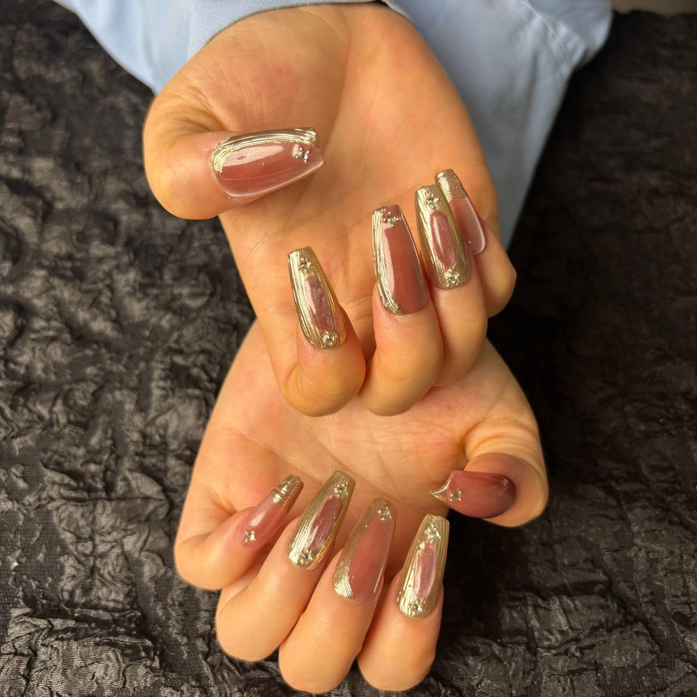 AKA Unicorn dark red cat-eye press-on nails with glossy finish for a glamorous look
