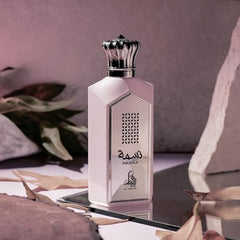 Al Absar Nasma perfume cap closeup, sleek design and lasting scent.