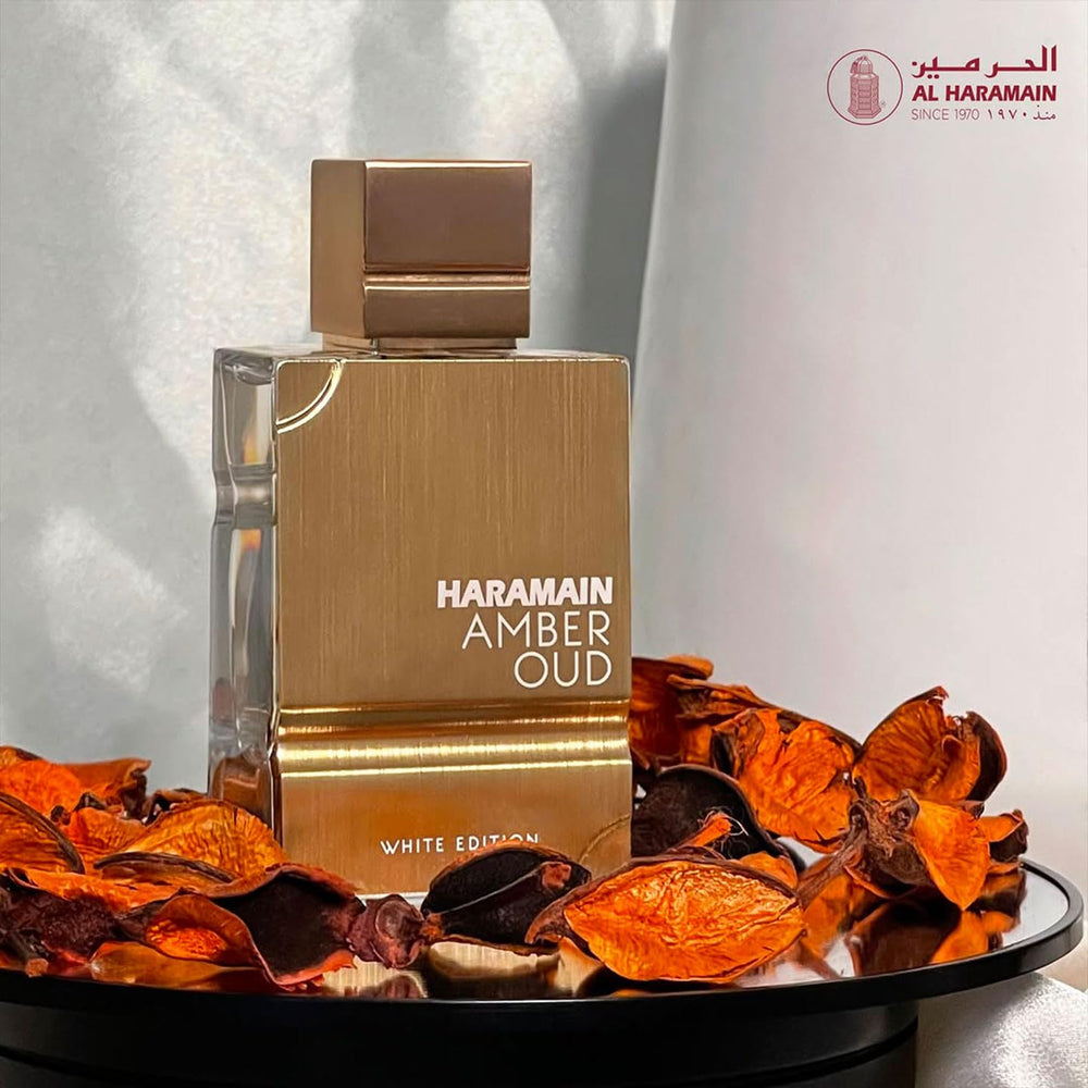 Al Haramain Amber Oud White Edition bottle label, premium craftsmanship visible.