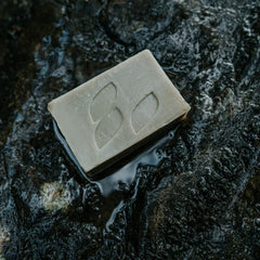 Goat milk and organic oils featured in the Alaska Glacial Essentials bar for gentle hydration.