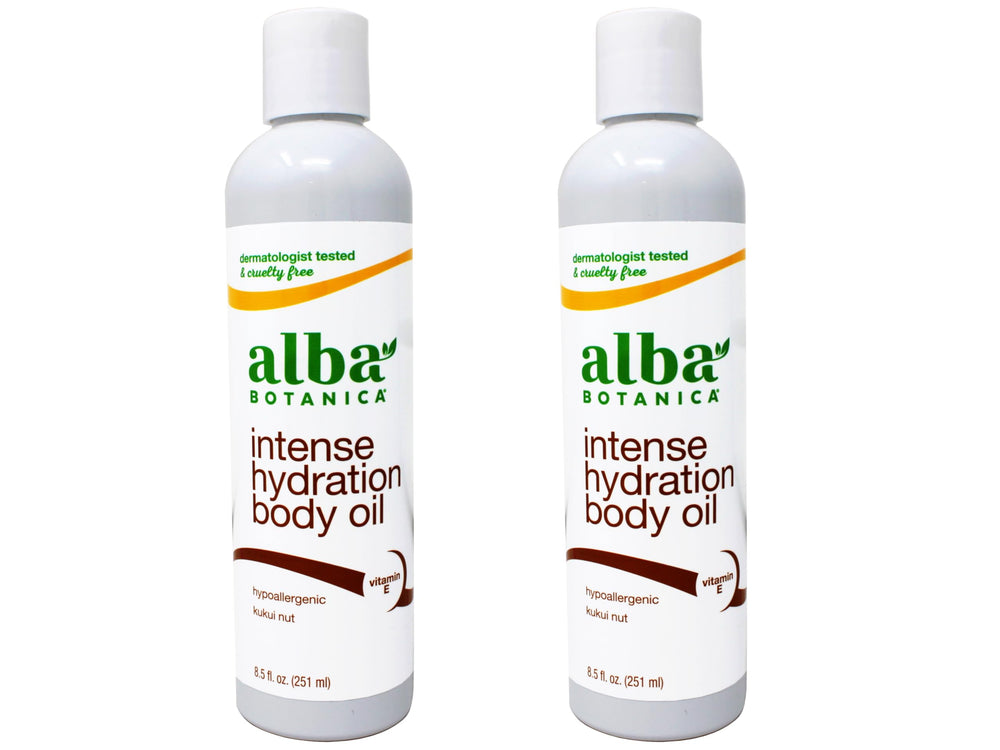Alba Botanica kukui nut body oil two-pack bottles on display for island hydration.