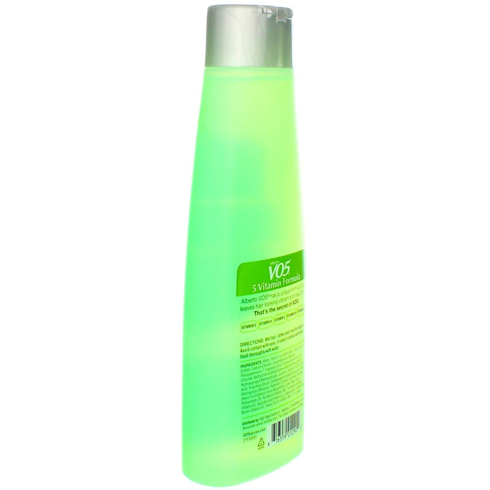 Alberto VO5 Kiwi Lime Squeeze bottle pour during lather demonstration.