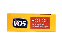 Alberto VO5 hot oil being dispensed from the tube for quick nourishment.
