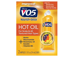 VO5 hot oil treatment packs on a shelf for quick hair moisture.
