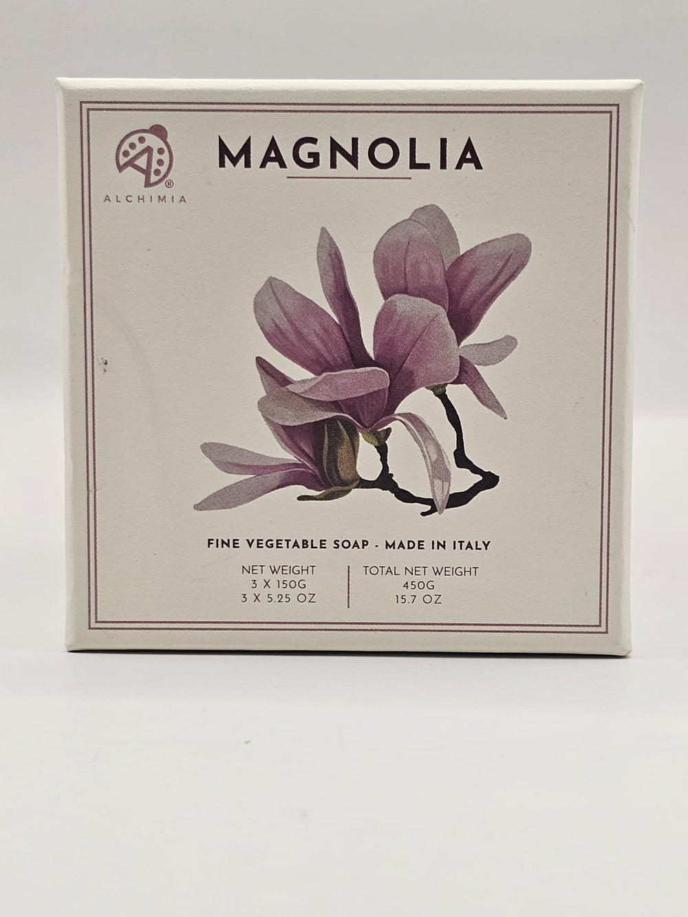 Alchimia Magnolia soap bar closeup highlights creamy texture and magnolia scent.
