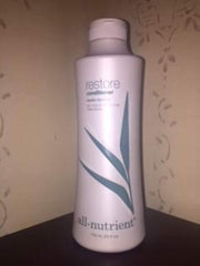 All Nutrient Restore Conditioner bottle provides moisture, shine, and color protection for healthy hair.