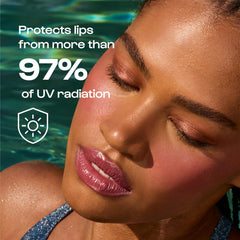 Application shot: serum-like glide that feels smooth and comfortable on lips.
