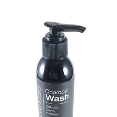 ALOA Charcoal Face Wash foam texture showing gentle exfoliation of pores.