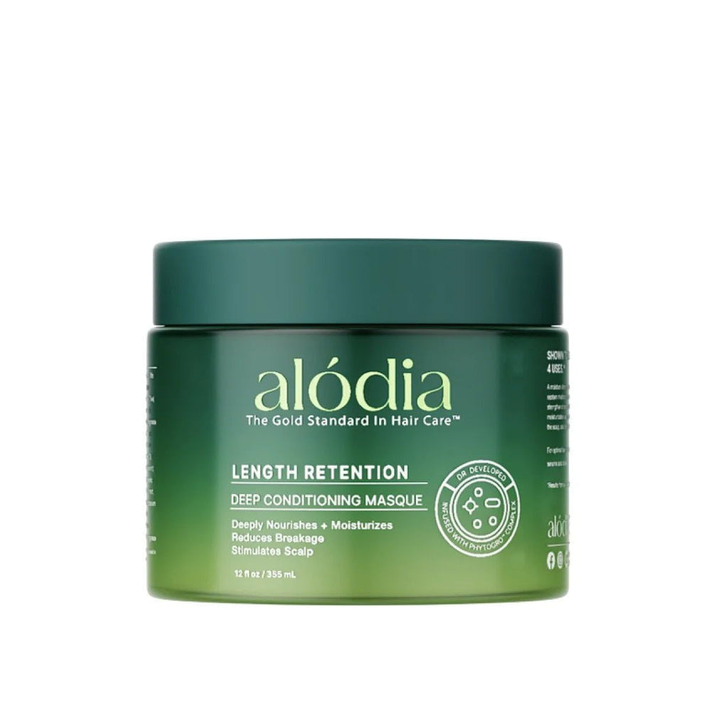ALODIA Deep Conditioning Masque bottle close-up showing hydration for curls.