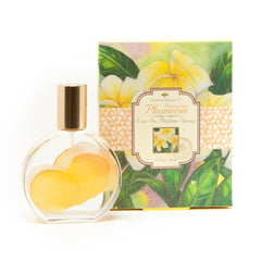 Aloha Beauty Plumeria EDP bottle with silk flowers for tropical fragrance.