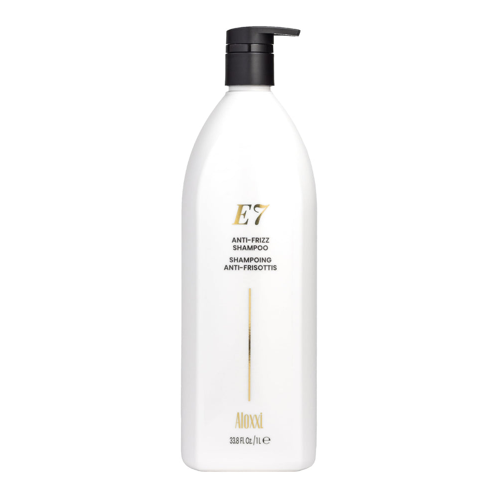ALOXXI E7 shampoo packaging highlights a color-safe, antioxidant-rich formula for damaged hair.