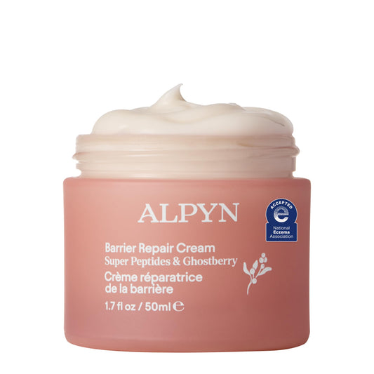 Alpyn Beauty jar close-up showing rich moisturizer texture for skin comfort.
