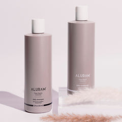 ALURAM packaging highlights silicone-free, sulfate-free, and clean beauty formula.