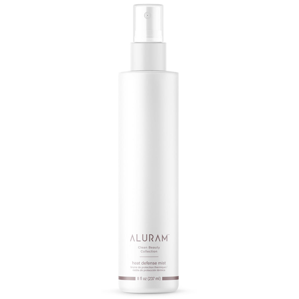 ALURAM Heat Defense Mist bottle front shows lightweight protection for all hair types.