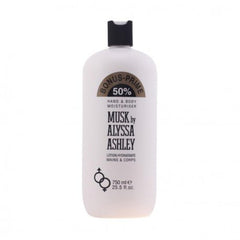 Alyssa Ashley Musk lotion being applied for long-lasting moisture.