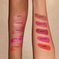 Cheek swirl with Desert Date Multistick Pink Sel for subtle rosy glow