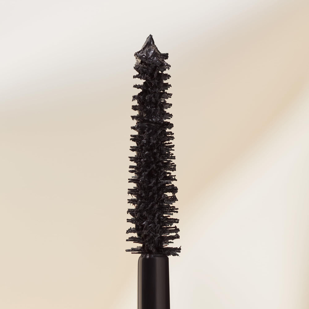 Close-up of the Rich Black wand showing a buildable brush for fuller lashes.