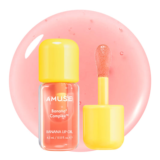 Amuse Seoul Banana Lip Oil bottle closeup showing lightweight hydration and glossy finish.