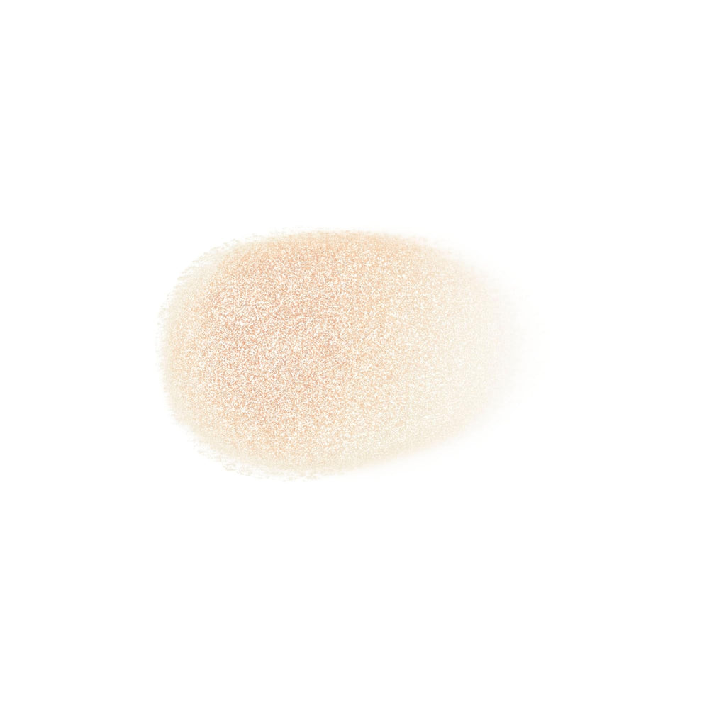 Anna Sui Face Multi Balm Sepia swatch reveals warm tone and easy blendability.