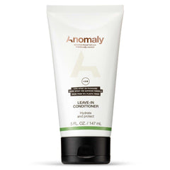Anomaly Leave-In Conditioner bottle pour highlights detangling and smoothness.