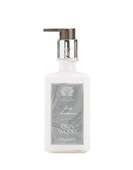 Antica Farmacista body moisturizer in ironwood bottle for daily hydration and subtle fragrance.