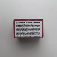 AOU Glowy Tint Balm lip-gloss finish on lips for natural shine