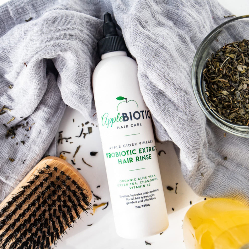 Bottle showing sulfate-free, paraben-free, fragrance-free benefits for clean hair.
