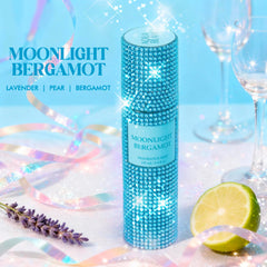 AQUA BLANCE diamond-embellished fragrance mist bottle shines on a vanity.